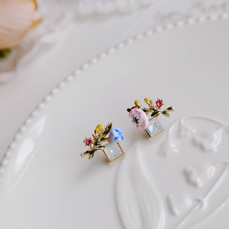 Asymmetrical Floral Creativity with a Painted Forest Aesthetic Earrings