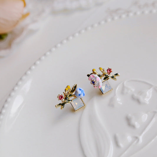 Asymmetrical Floral Creativity with a Painted Forest Aesthetic Earrings