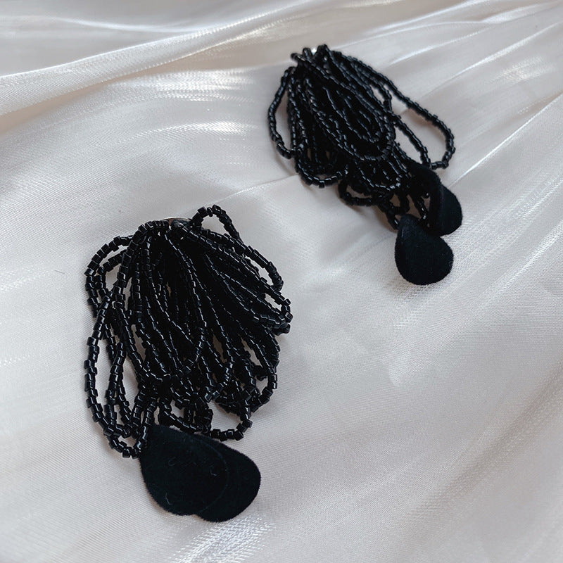 Artisanal Flower Petal Beaded Tassel Earrings for a Stylish Edge